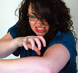 thefix_womanscratching