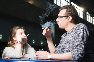 man woman smoking