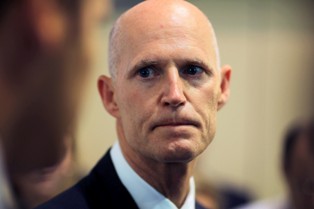 rick scott sad