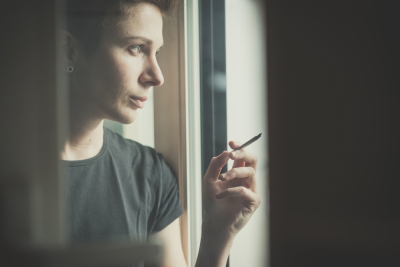 young woman smoking joint