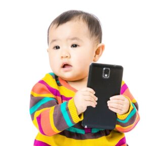 Children Are Addicted To Screens, And It’s Seriously Hurting Them baby smartphone