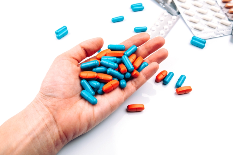 hand outstretched pills