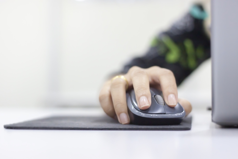 woman clicking mouse
