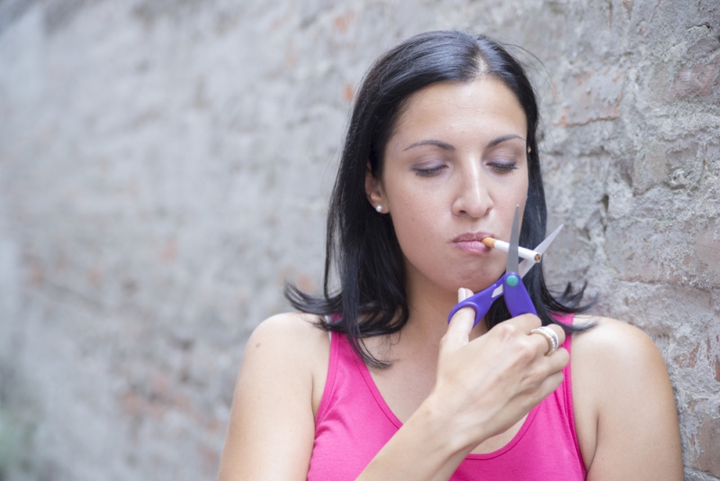 woman cutting cig