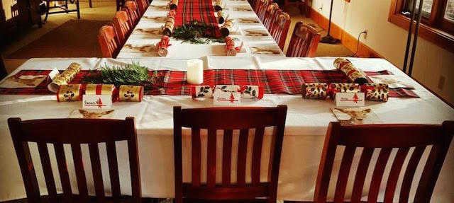 A table set up for Christmas.
