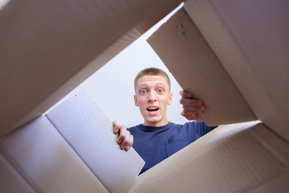 Man opening box.