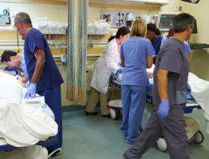 Doctors inside an emergency room.
