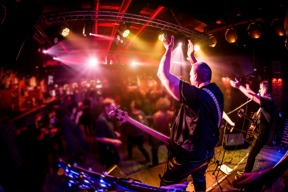 A band playing live music at a club.