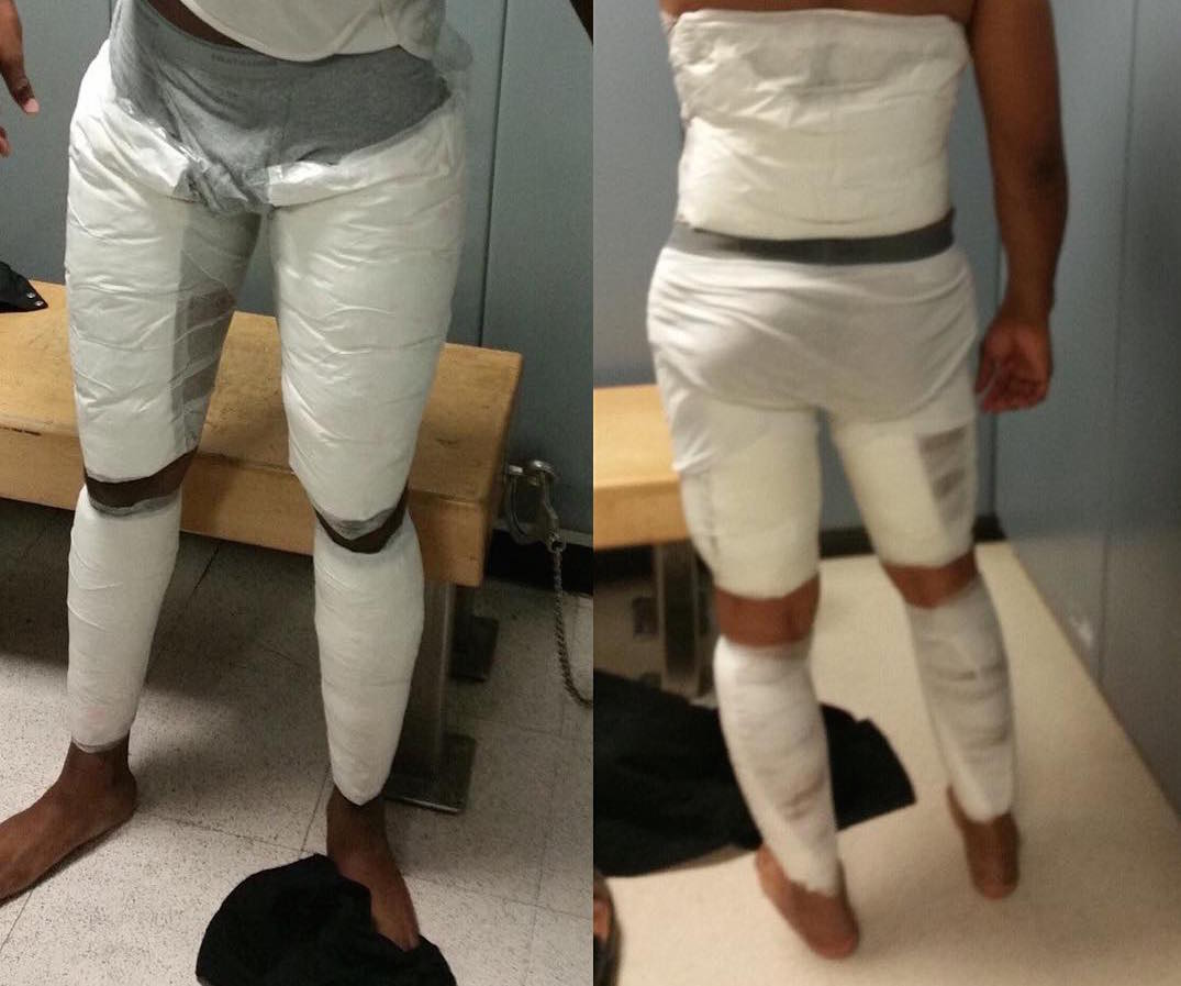 Elvin Montilla-Sosa and Ariel Garcia with cocaine taped to their legs.