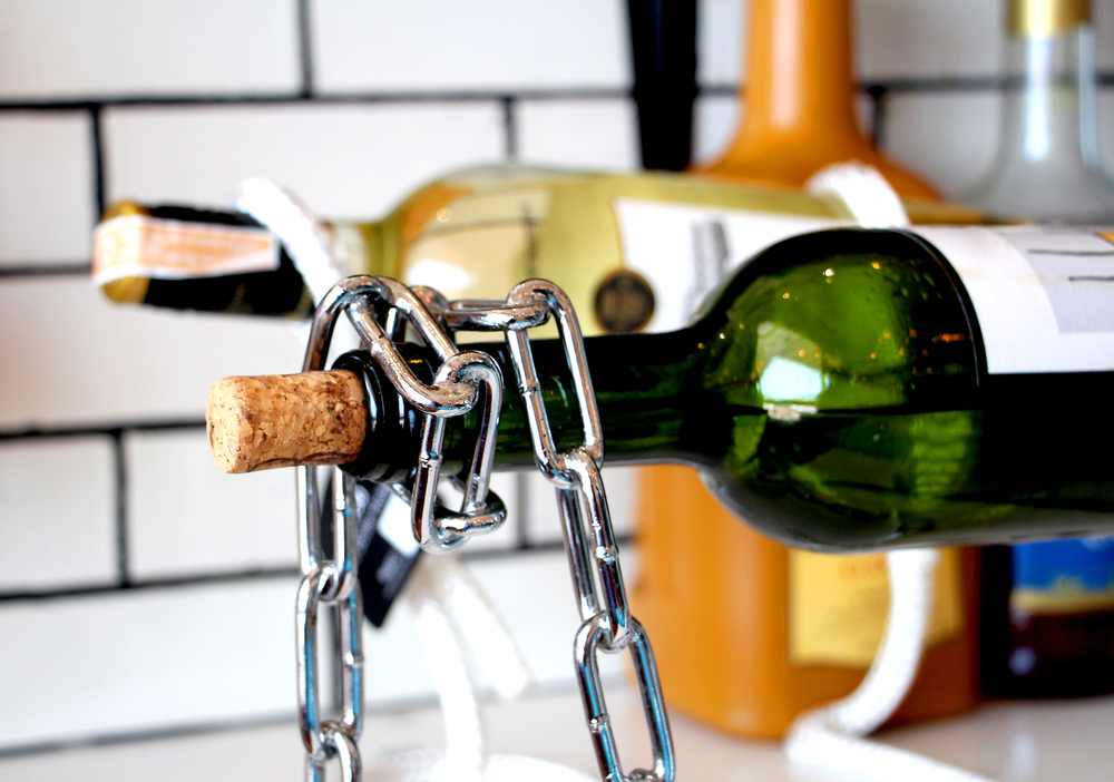wine bottle with chains on it