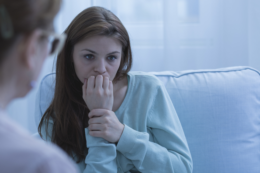 worried woman in counseling