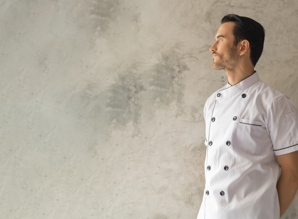 Male chef in a white coat