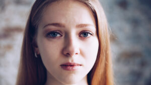 sad girl looking at camera