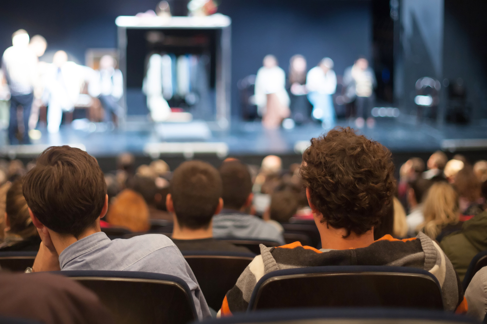 audience watching a stage play