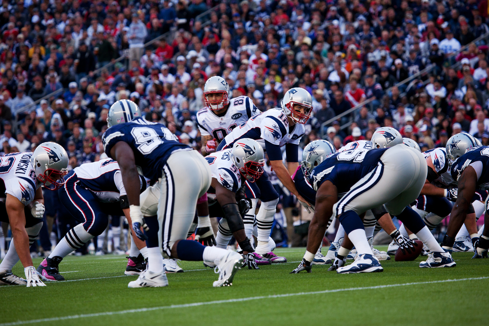Quarterback Tom Brady, No 12, takes hike at Gillette Stadium