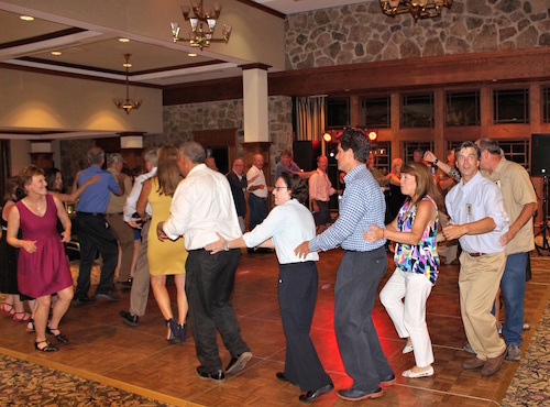 Author dancing far left. She was invited to join the conga line by her classmates. And she did