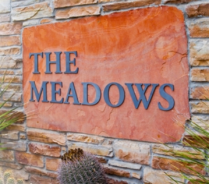 The Meadows sign