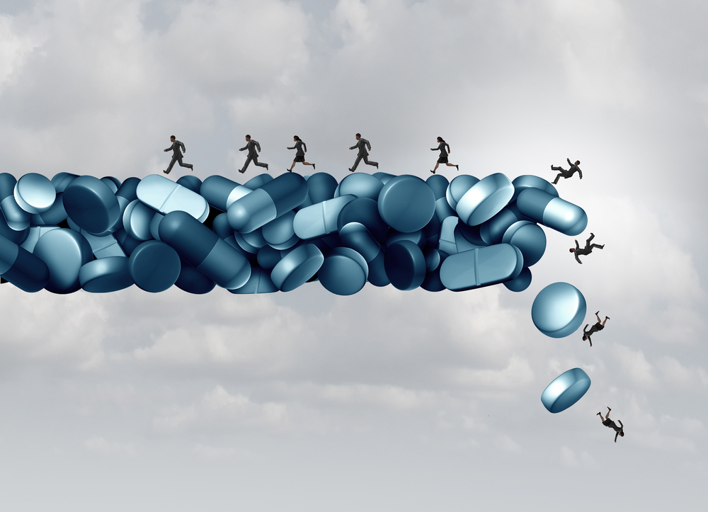 prescription painkiller addiction epidemic concept as a group of people running away from a falling bridge of pills