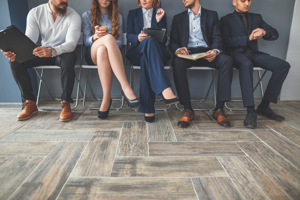 young adults waiting for job interview