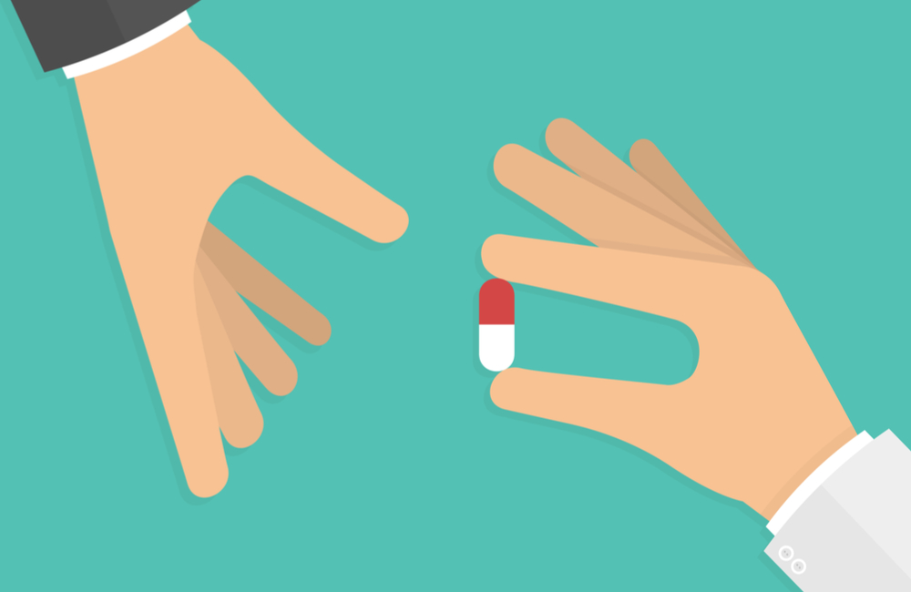 A cartoon of one hand handing a capsule to another.