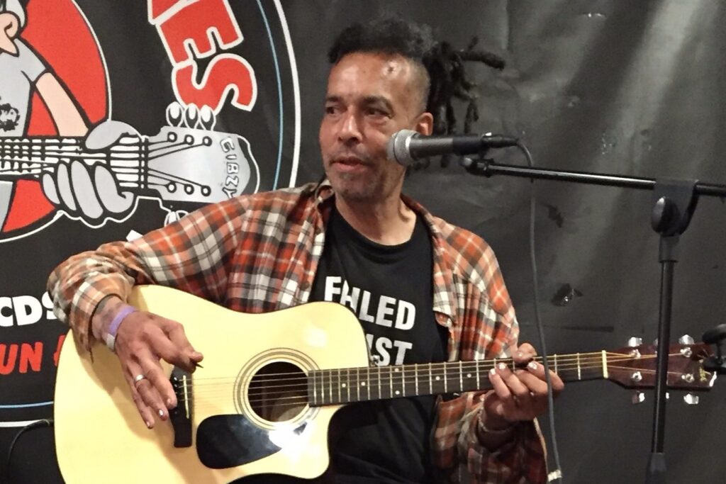 Chuck Mosley performing at Looney Tunes Records in Babylon, NY, on July 18, 2016.