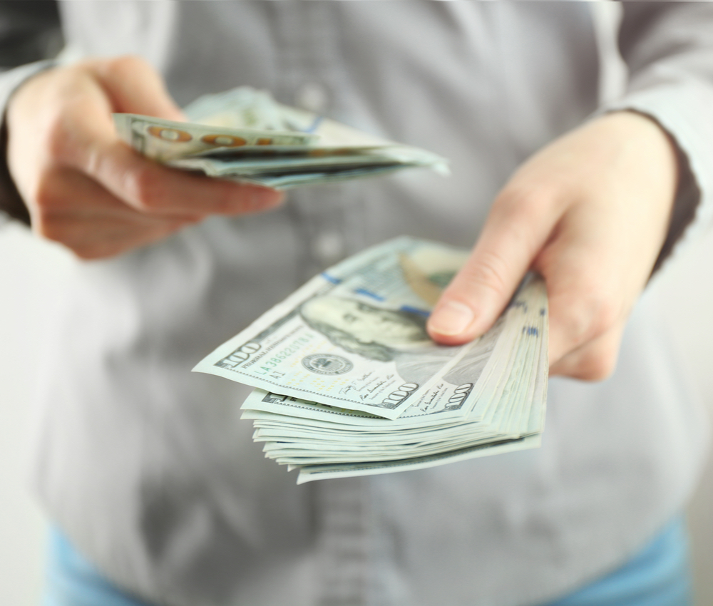 person counting cash