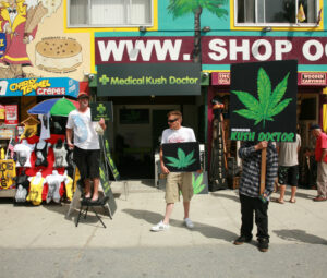 People hawking "Medical Marijuana" on the Venice Beach Board Wal