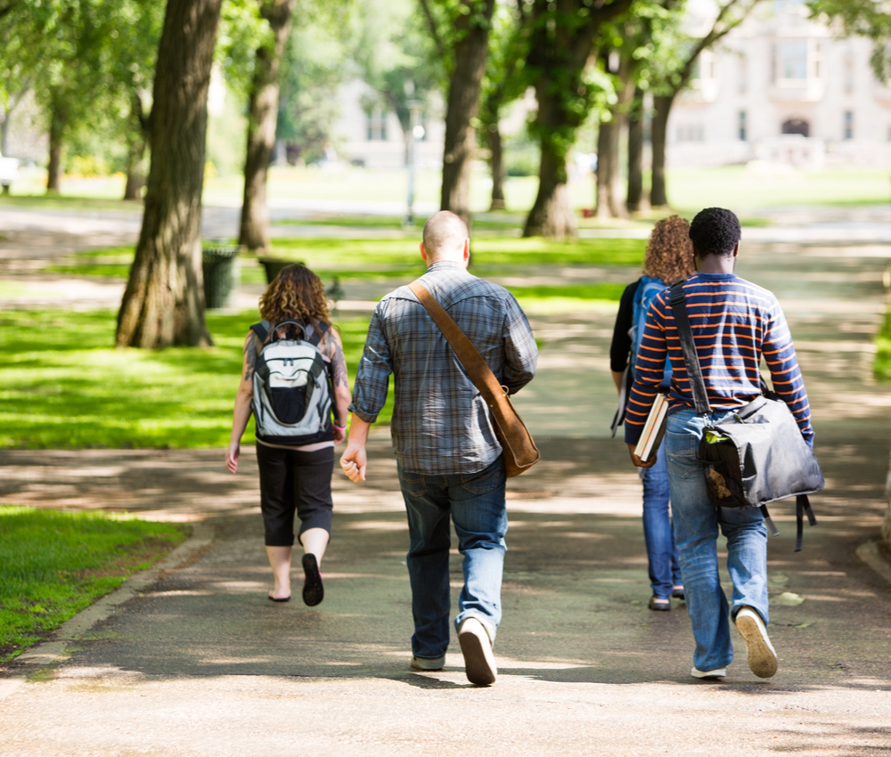 college students walking around on campus