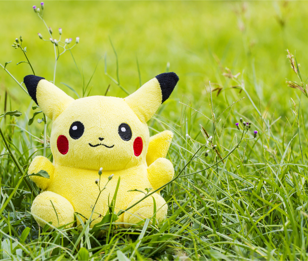 Pikachu sitting in the grass