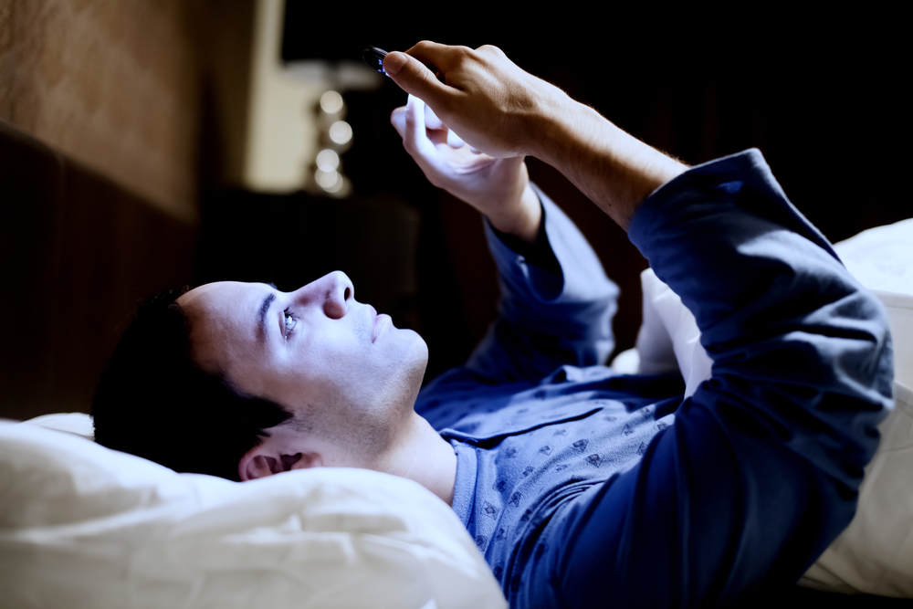 using phone in bed