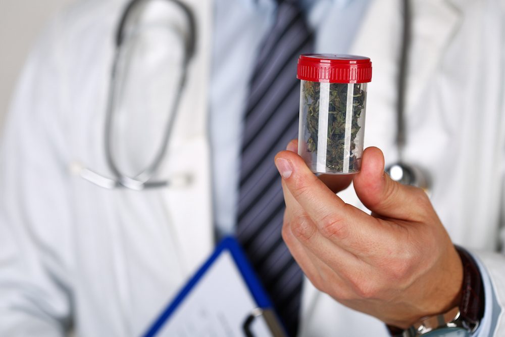 doctor holding medical marijuana