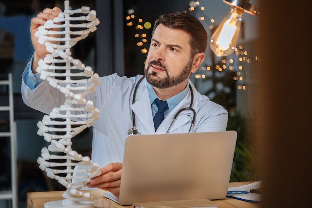 researcher studying genetics