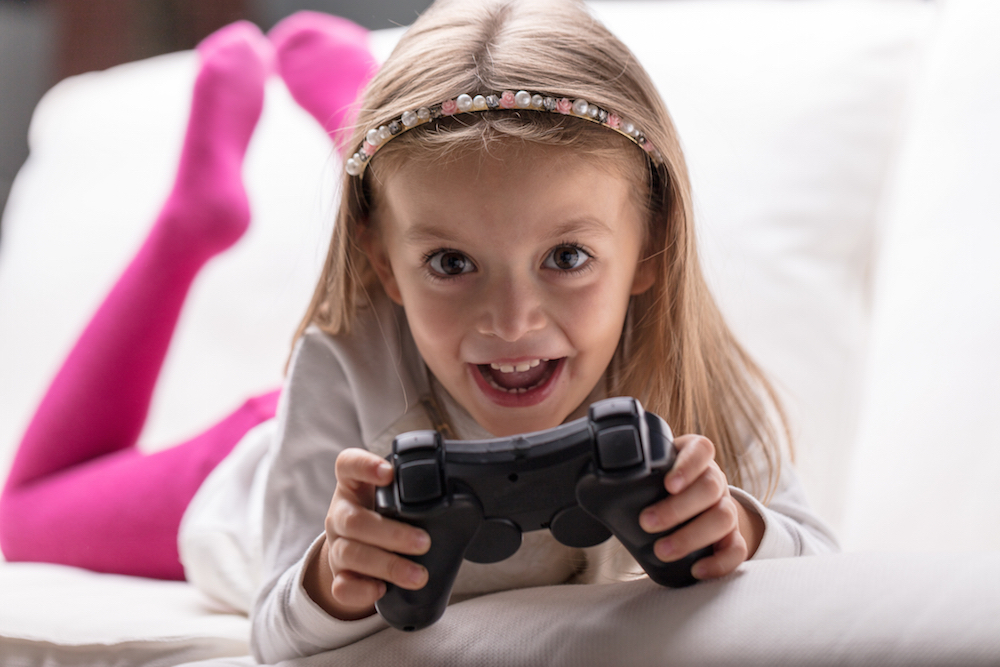 young girl playing video games