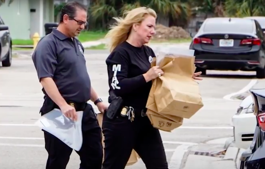 police officials handling evidence