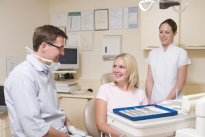 dentist talking to patient