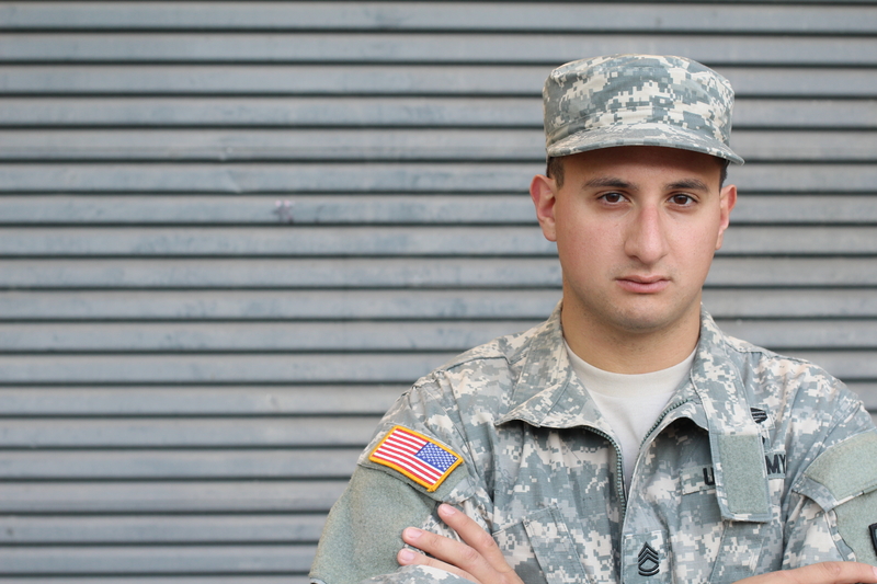 Man with serious expression on his face, wearing U.S. Army uniform.
