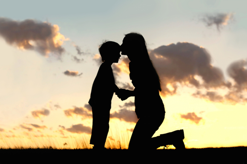 silhouette of mother and child