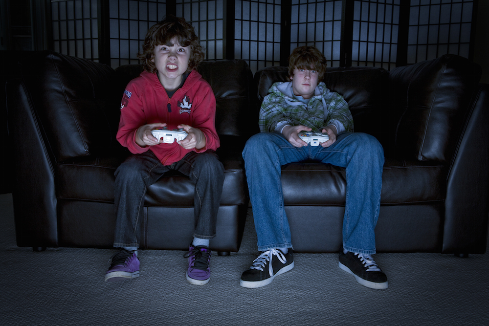 two boys playing video games