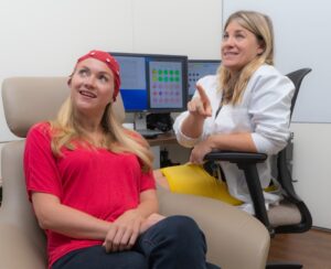 Patient and doctor discussing brain imaging results