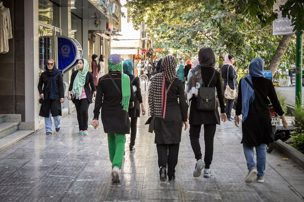 people walking on a street in Isfahan, Iran