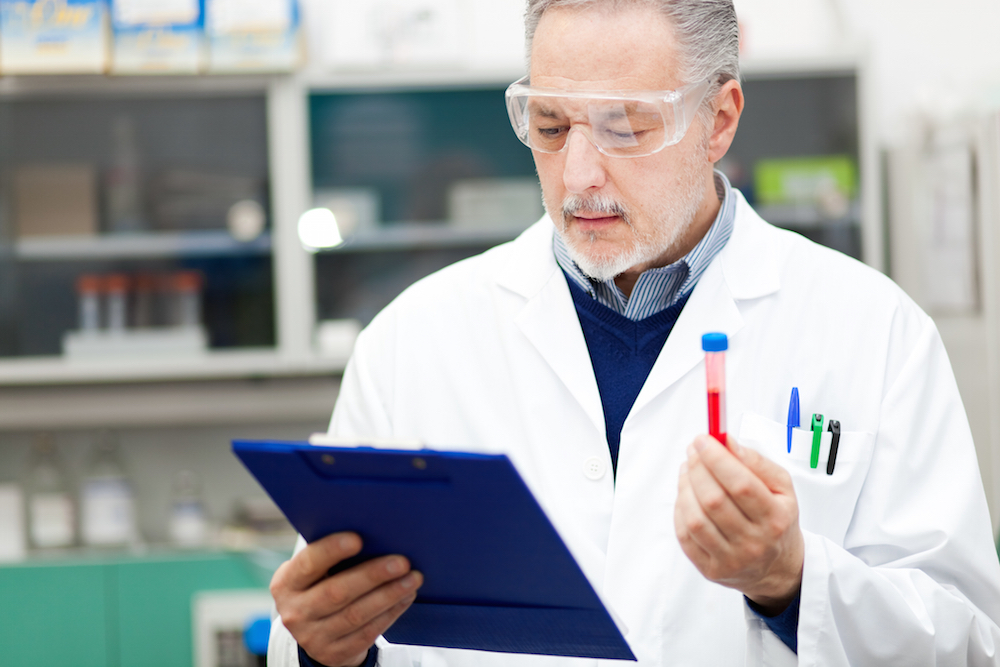 scientist holding a test tube