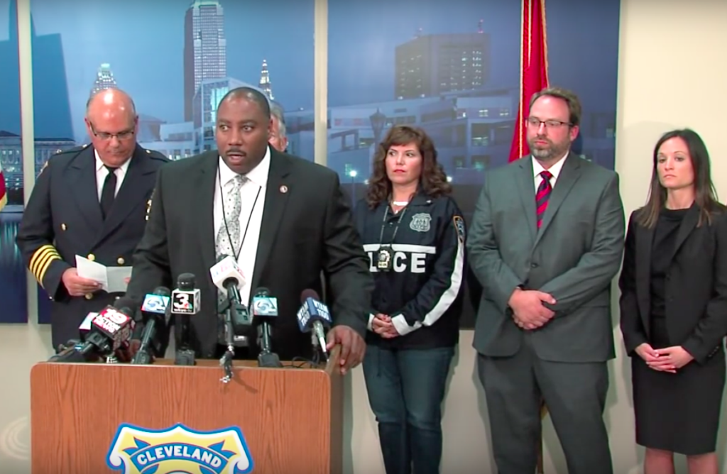 Law enforcement officials announcing the drug bust