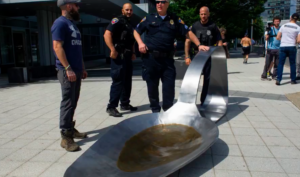 heroin spoon sculpture outside of Purdue Pharma