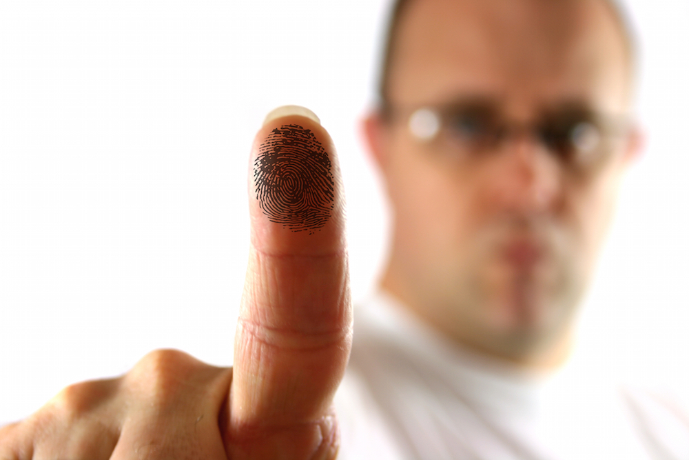 Man holding up index finger