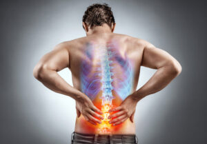 man with back pain waiting for new non-opioid treatment for back pain