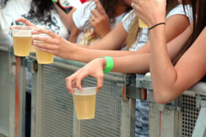 women holding cups filled with alcohol in the US