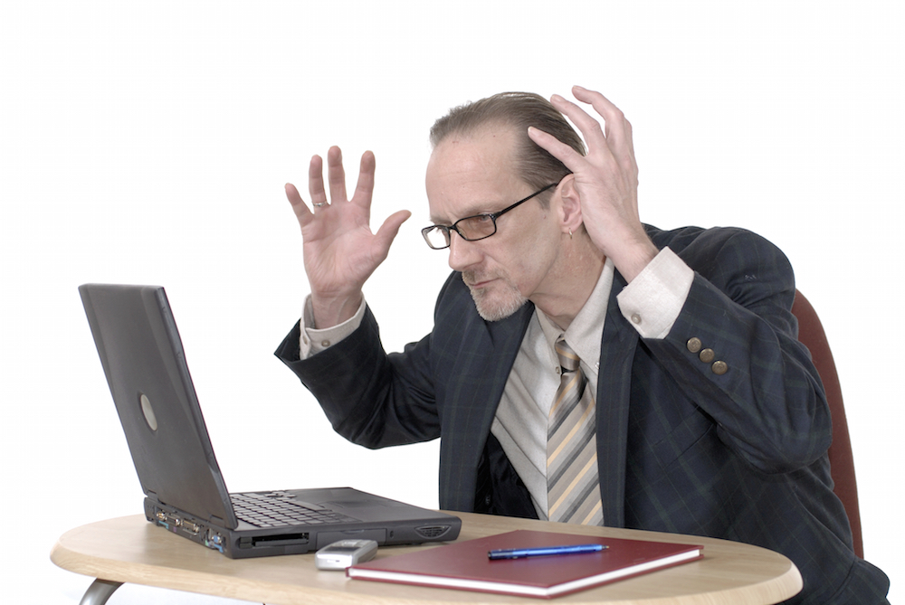 businessman with internet addiction getting angry because wifi failed