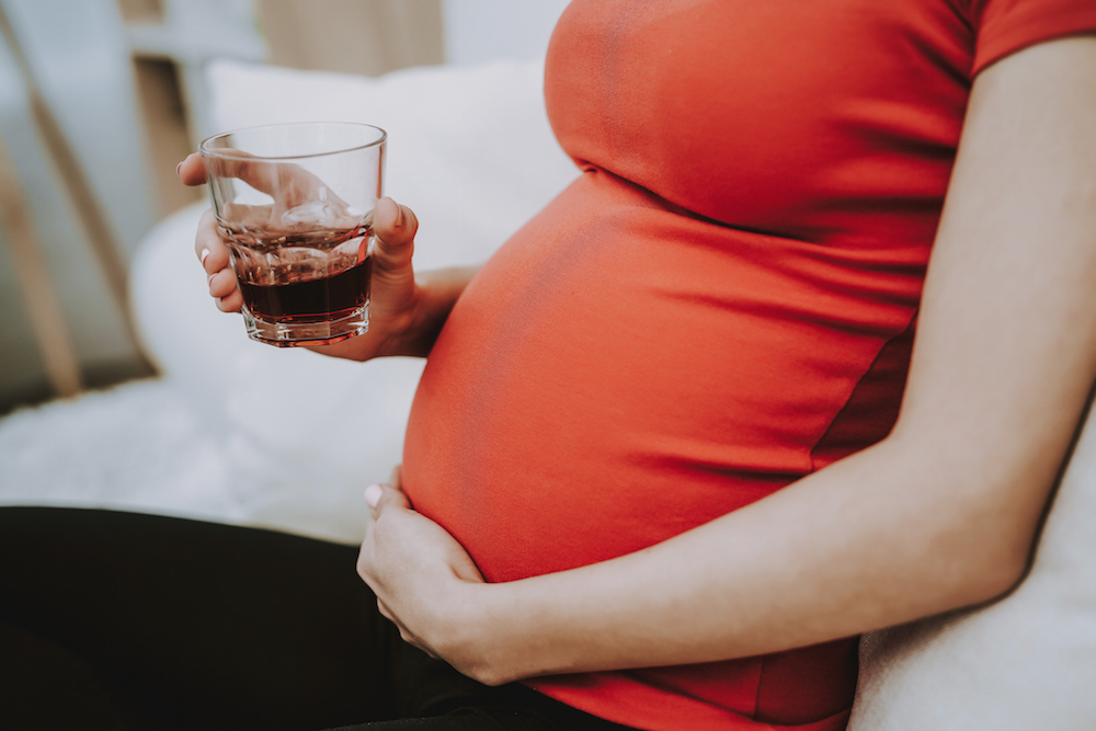pregnant woman with alcohol beverage