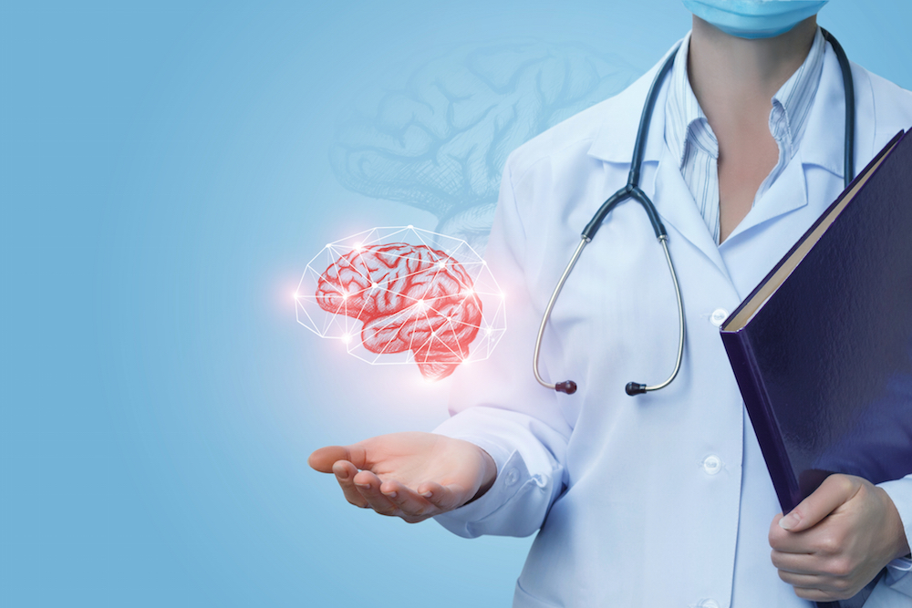 doctor holding brain