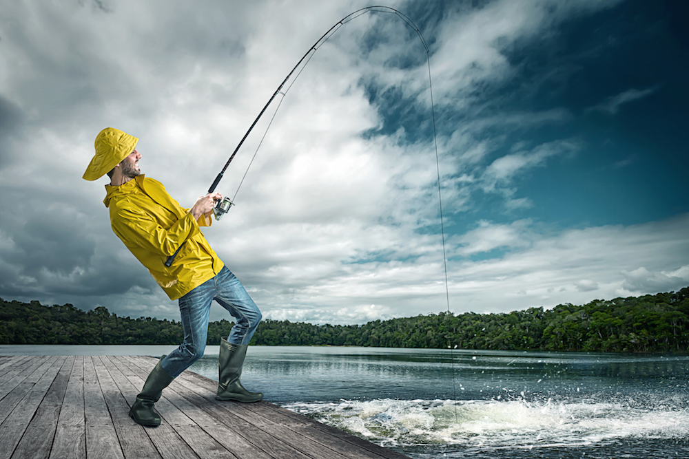 Fisherman reeling in a big bale of cocaine